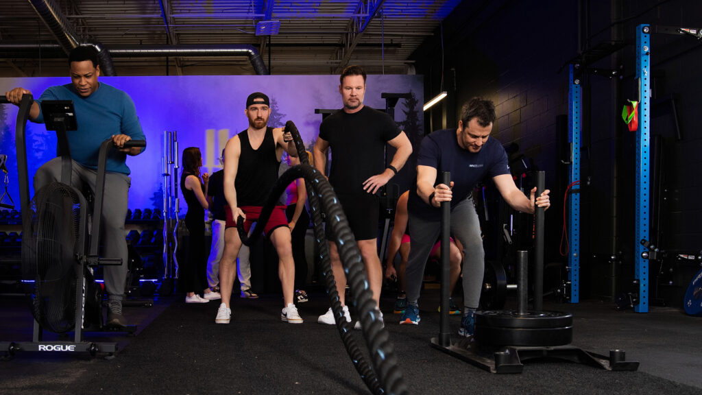 photo of Carl working with clients at the studio